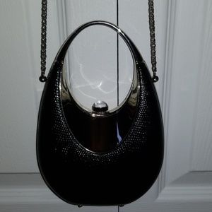 Hard shell evening bag.